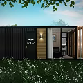 Cozy Container Leisure Area With Black Exterior Wooden Panels Grass And White Flowers