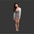 Smiling Woman With Long Hair In Gray Dress And Light Gray Cardigan Against Gray Background