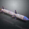 Rusty Military Missile Model with Blue Tip and Multiple Fins on Dark Background