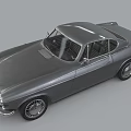 Classic Gray Two Door Car With Sleek Body And Vintage Hardtop Wheels