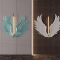 Wing Shaped Wall Decor with Turquoise and White Design Illuminated on Modern Walls