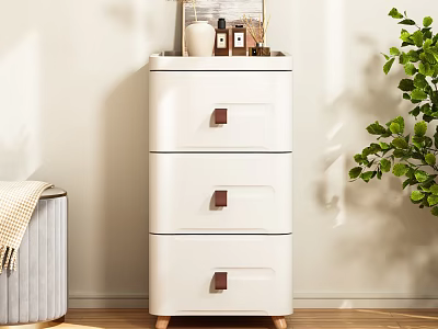 White Three Drawer Chest of Drawers With Red Handles Near Green Plant On Wooden Floor 3d model