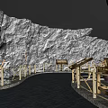 Cultural Center Interior With Rock Textured Walls Wooden Railings Water Floor And Vintage Tools