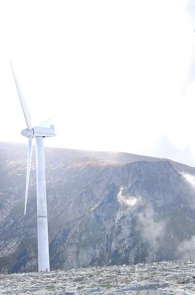 Tall White Wind Turbines Standing in Mountainous Landscape With Cloudy Sky 3d model