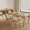 Wooden Kids Table With Matching Chairs Colorful Toys And Storage Cabinet In Bright Room