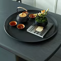 Elegant Decorative Ornaments Set With Black Tray Teapot Cups Green Plant And Magazine
