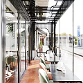 Elegant Modern Restaurant Interior With Stylish Tables Chairs Ceiling Lights And Decorative Wall Art