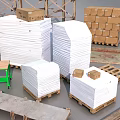 Industrial Equipment Components Including Metal Frames Storage Racks Pipes And Wooden Crates