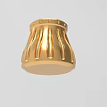 Elegant Golden Decorative Ornament Set With Intricate Vertical Stripes And Top Details