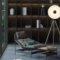 Elegant Lounge Chair With Green Cushion Ottoman And Floor Lamp In Dark Bookshelf Interior