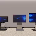 Three Different Sizes TVs With Black Stands On Gray Carpet Showing Colorful Dynamic Backgrounds