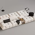 Beige Tufted Sectional Sofa With Black Cushions Floor Lamp And Side Table
