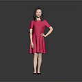 Elegant Woman Standing In Red Dress With Gray Background And Hand On Hip