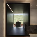 Modern Reception Area Interior With Dark Wooden Counter Stone Wall Small Plant And Bench
