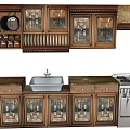 Wooden Kitchen Cabinets With Glass Doors Holding Dinnerware Spices And Marble Countertops