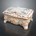 Floral Decorative Porcelain Box With Blue Flower Patterns Gold Accents And Carved Legs