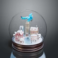 Snow Globe With Small Houses Tower Airplane And Snowflakes On Wooden Base