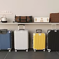 Colorful Rolling Luggage Cases and Designer Handbags on Minotti Shelf