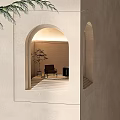 Modern Archway Interior With Steps Comfortable Chair Side Table And Green Plant