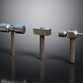 Essential Hardware Tools Three Different Hammers with Metal Heads and Wooden Handles