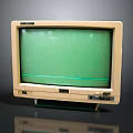 Vintage Computer Monitor With Green Screen And Beige Casing Design