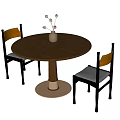 Round Wooden Dining Table With Metal Base And Dark Chairs Featuring Vase