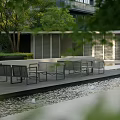 Stylish Outdoor Chairs On Patio With Pool And Trees Near Modern Building