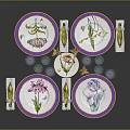 Elegant Floral Patterned Dinnerware Set Plates with Purple Rim Glasses and Decorative Napkins