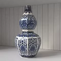 Blue and White Gourd Shaped Ceramic Vase With Traditional Pattern On White Surface 3d model