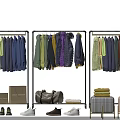 Colorful Clothes on Stylish Racks with Assorted Bags Shoes and Folded Garments