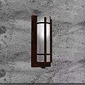 Rustic Wall Sconce With Wooden Frame And Clear Glass Shade On Textured Gray Wall