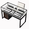 Jewelry Store Glass Display Counter With Rings Necklaces Earrings And Organized Setup