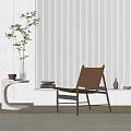 Modern Minimalist Accent Chair with Stripped Wall Side Table Potted Plant and Vases
