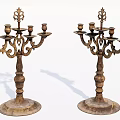 Vintage Ornate Metal Candelabra With Decorative Carvings And Multiple Candle Holders