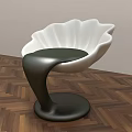 Modern Petal Shaped White Chair With Black Curved Base And Wooden Floor