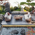 Serene Garden With Water Pool Stones Wicker Sofas Wooden Coffee Table Lanterns And Green Plants