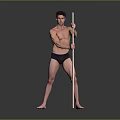 Shirtless Man in Black Underwear Standing with Long Pole Against Gray Background on Black Floor