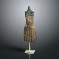 One Shoulder Decorative Patterned Dress With Pleated Hem Displayed On Mannequin