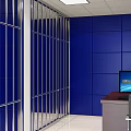 Monitoring Room Interior With Blue Walls Badge And Computer Monitors For Law Enforcement