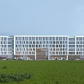 Modern Office Building With Glass Facade Green Lawn And Front Parking Area