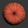Fresh Red Striped Apple With Brown Stem On Black Reflective Surface