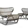 Pair of Modern Rattan Lounge Chairs With Metal Frame And Curved Backrest Design