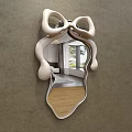Bow Shaped White Frame Mirror Reflecting Modern Room Interior With Furniture