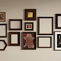 Decorative Picture Frames In Various Shapes And Styles On Wall 3d model