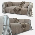 Cozy Two Seater Sofa With Soft Cushions Plaid Blanket And Textured Fabric Skirt