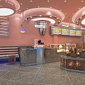Cozy Bakery Interior With Pink Walls Round Ceiling Lights Display Cases And Bread Baskets