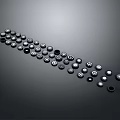 Round Black and Silver Automotive Parts Various Sizes Irregular Curved Arrangement Gray Background