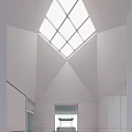 Modern Sales Office Interior Featuring Skylight And Geometric Ceiling Design Elements 3d model