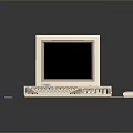 Vintage Computer Setup Featuring Monitor Keyboard Mouse and Floppy Disk on Dark Surface