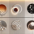 Circular Wall Hangings With Various Textures Multiple Colors And Light Rings On Wall